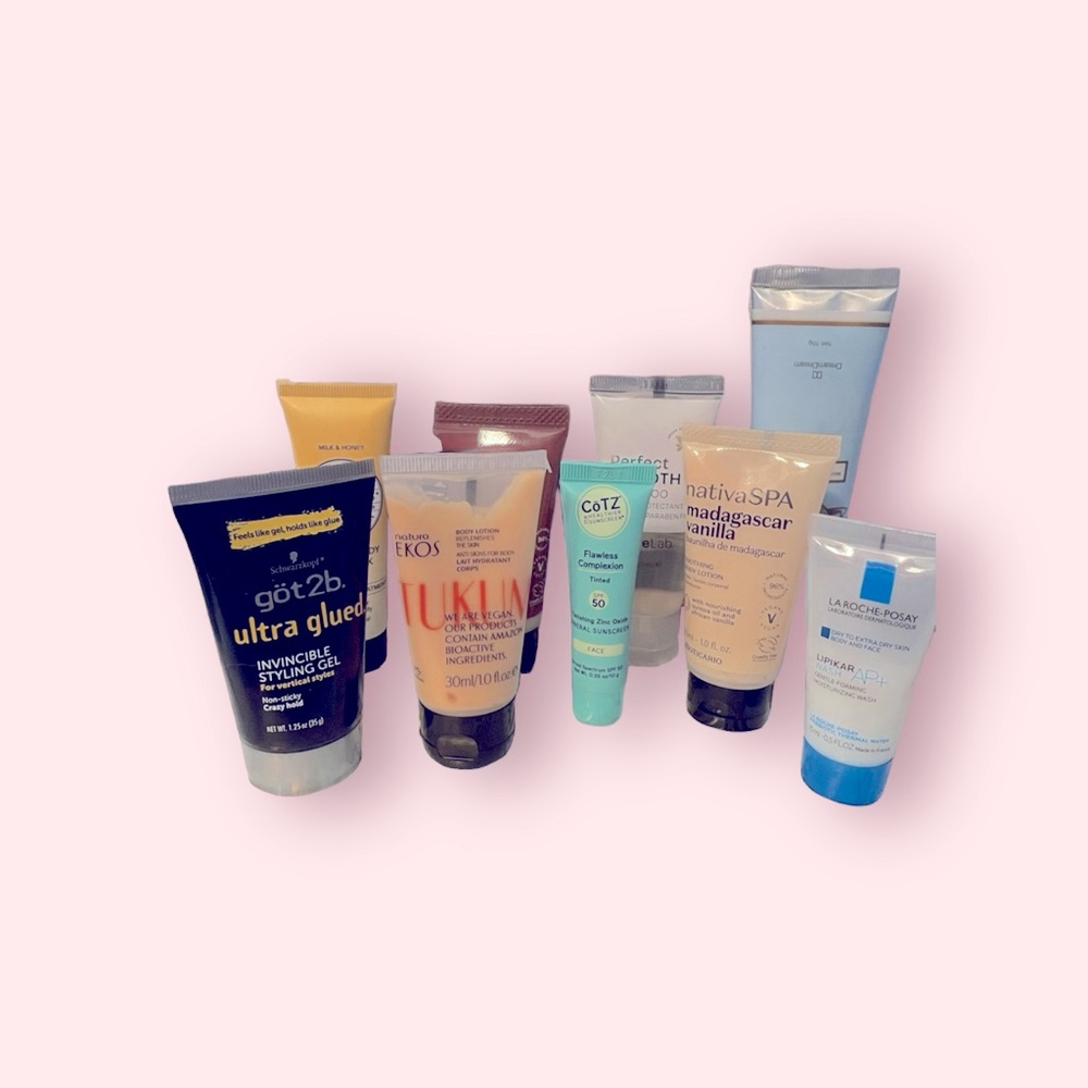 8 travel size pieces~one full size~various hand/body lotion shampoo style gel